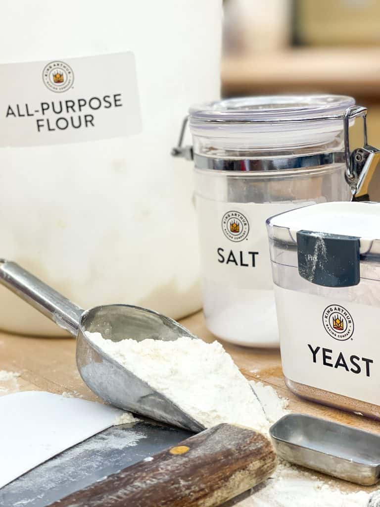 Containers of flour, salt and yeast